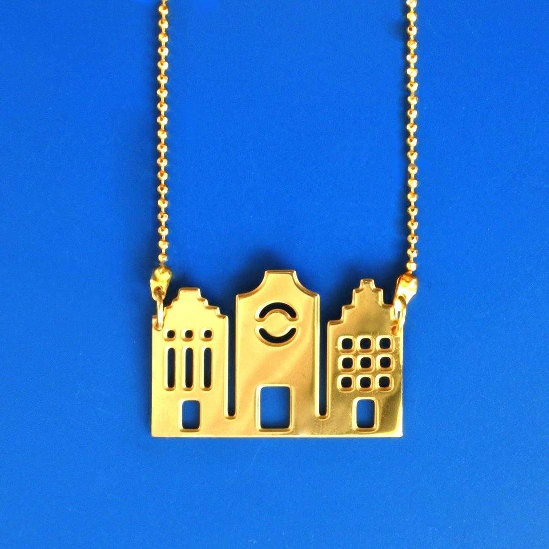 Canal houses golden necklace