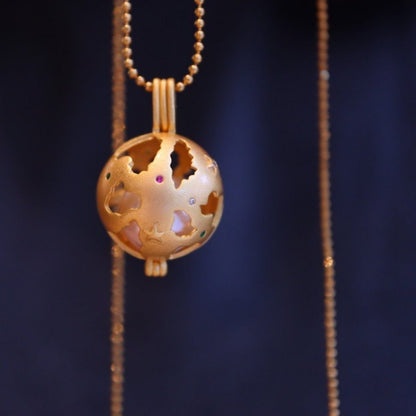 Mother Earth - Unique design matt gold hollow ball cage pendant with earth pattern - Gold vermeil - openable